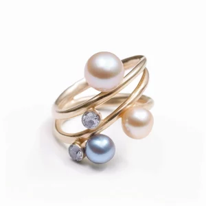 gold spiral ring with pearls and blue gemstones