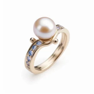 gold ring with pearl and sapphire accents