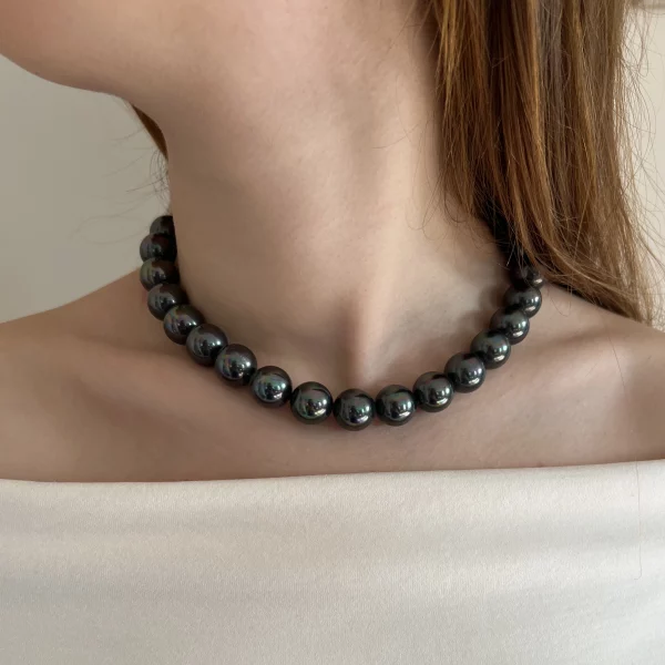 Black Shell Pearl Necklace view 2, shell pearl, with pearl, shown on person.