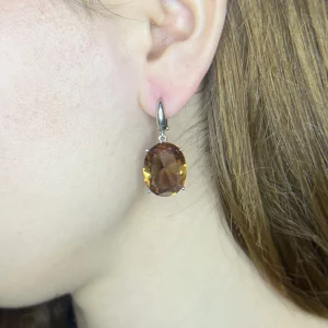 zultanite silver earrings, on model