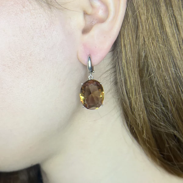zultanite silver earrings, on model