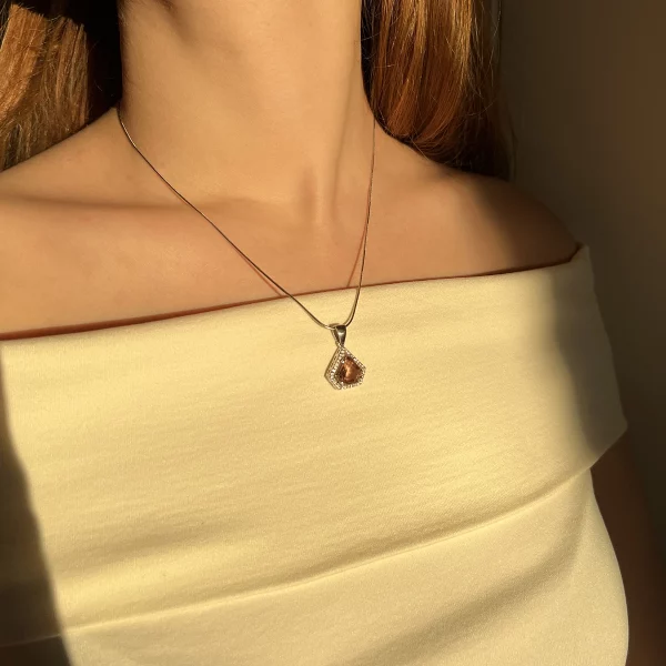 zultanite pendant, on model