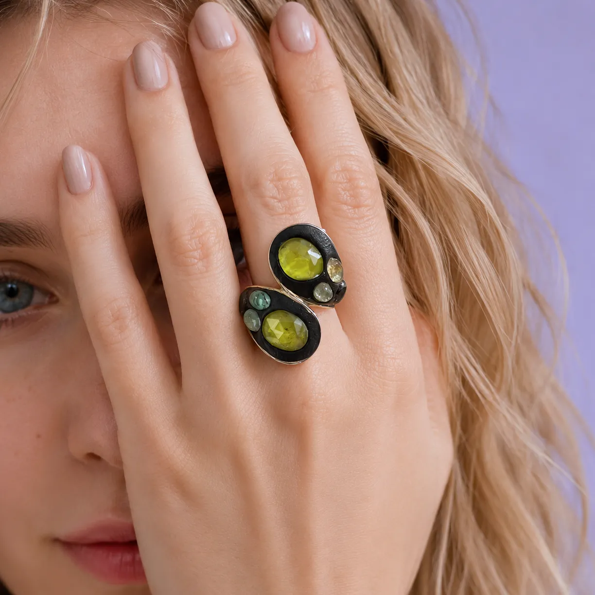 Peridot Ring in sterling silver, worn on hand